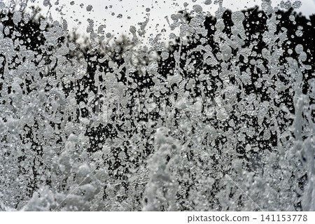 A dynamic water sculpture capturing a moment of silence. A dynamic water sculpture capturing a moment of silence. 141153778