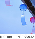 A cool wind chime swaying in the blue sky, a symbol of summer. (Square size) 141155038