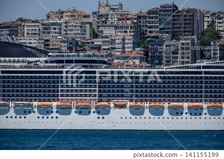 Cruise Liner at Port with Istanbul Cityscape. Cruise Liner at Port with Istanbul Cityscape. 141155199
