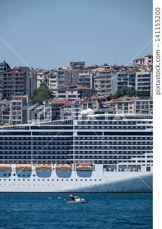 Cruise Liner at Port with Istanbul Cityscape. Cruise Liner at Port with Istanbul Cityscape. 141155200