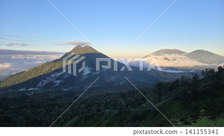 This is sunrise and fog in Ijen Mountain in East Java, Indonesia This is sunrise and fog in Ijen Mountain in East Java, Indonesia 141155341