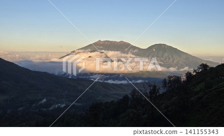 This is sunrise and fog in Ijen Mountain in East Java, Indonesia This is sunrise and fog in Ijen Mountain in East Java, Indonesia 141155343