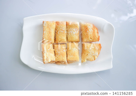 toast or bread with butter topping , toast bread or sliced bread with butter and sugar topping toast or bread with butter topping , toast bread or sliced bread with butter and sugar topping 141156285
