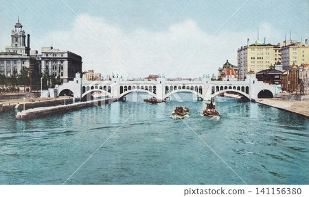 Old photograph, 1929-1933, Dojima River Movable Weir (present-day Suisho Bridge) in Osaka City. Old photograph, 1929-1933, Dojima River Movable Weir (present-day Suisho Bridge) in Osaka City. 141156380