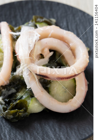 Delicious squid with vinegared miso dressing Delicious squid with vinegared miso dressing 141156404