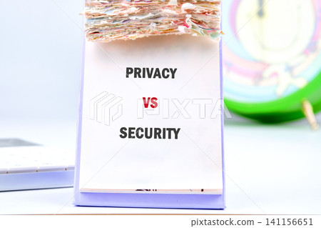 Several people are talking about the topic of privacy and security with papers and notes set on a table near an alarm clock while time passes in the background Several people are talking about the topic of privacy and security with papers and notes set on a table near an alarm clock while time passes in the background 141156651