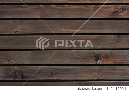 Macro texture of horizontal brown wooden planks background Macro texture of horizontal brown wooden planks background 141156934
