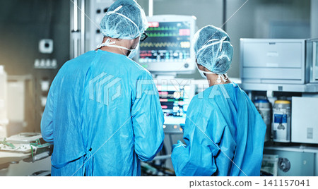 Surgery, back or surgeons with teamwork for emergency, accident or healthcare in hospital clinic. Heart rate monitor, medical or doctors in surgical collaboration in operating room to support or help 141157041