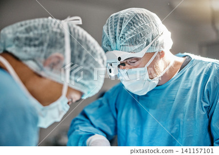 Surgery, operation or surgeons with teamwork for emergency, accident or healthcare help in hospital clinic. Theatre procedure, icu or doctors in surgical collaboration in operating room to support Surgery, operation or surgeons with teamwork for emergency, accident or healthcare help in hospital clinic. Theatre procedure, icu or doctors in surgical collaboration in operating room to support 141157101