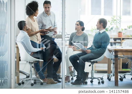 Employees, talking and office for meeting or planning for teamwork and profession in organisation. Diverse people or colleagues for discussion and career for employment and ideas for company indoor Employees, talking and office for meeting or planning for teamwork and profession in organisation. Diverse people or colleagues for discussion and career for employment and ideas for company indoor 141157486
