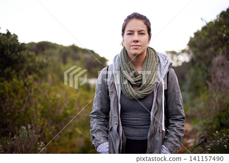Woman, hiking and outdoor in bush for portrait on path with fitness, walking or adventure on holiday. Girl, person and trekking in nature, hill or rocks by plants for journey on vacation in Cape Town Woman, hiking and outdoor in bush for portrait on path with fitness, walking or adventure on holiday. Girl, person and trekking in nature, hill or rocks by plants for journey on vacation in Cape Town 141157490