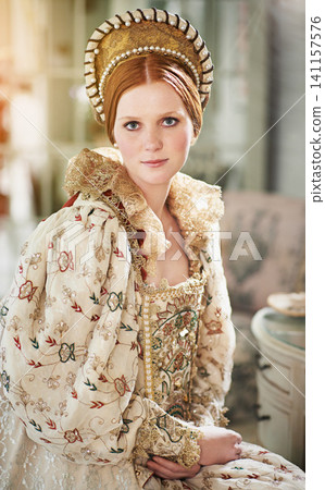Portrait, medieval and woman in a home with queen crown, renaissance and royalty in a palace room. Luxury, bedroom and royal female person in the morning with vintage and classic costume in history Portrait, medieval and woman in a home with queen crown, renaissance and royalty in a palace room. Luxury, bedroom and royal female person in the morning with vintage and classic costume in history 141157576