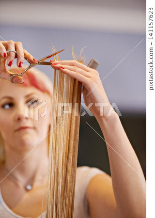 Beauty, woman at hairdresser and scissors for haircut, styling and maintenance for haircare. Grooming, luxury cosmetic treatment and stylist at professional salon with client, pamper and makeover Beauty, woman at hairdresser and scissors for haircut, styling and maintenance for haircare. Grooming, luxury cosmetic treatment and stylist at professional salon with client, pamper and makeover 141157623