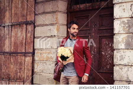 Flowers, man and outdoor with a smile and ready for a date with gift and bouquet of roses. City, present and town with male person with confidence and thinking about love and happy with floral plant 141157701