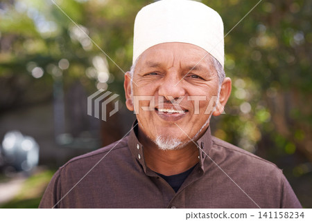 Happy, muslim and portrait of man outdoor with a smile in garden or relax on holiday in retirement. Arab, mature person and travel on vacation in summer to park or enjoy nature and trees in backyard Happy, muslim and portrait of man outdoor with a smile in garden or relax on holiday in retirement. Arab, mature person and travel on vacation in summer to park or enjoy nature and trees in backyard 141158234