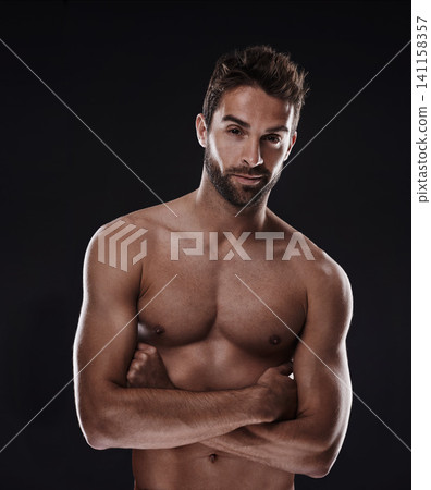 Portrait, muscle and body of confident man in studio isolated on a black background for wellness, sexy or six pack. Model, face and topless person with arms crossed for health and strong abs in Spain Portrait, muscle and body of confident man in studio isolated on a black background for wellness, sexy or six pack. Model, face and topless person with arms crossed for health and strong abs in Spain 141158357