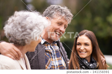 Senior parents, hug and outdoor with daughter, adult and happy with humor and bonding together. Nature, old mother or elderly father with embrace or vacation with smile or cheerful with weekend break Senior parents, hug and outdoor with daughter, adult and happy with humor and bonding together. Nature, old mother or elderly father with embrace or vacation with smile or cheerful with weekend break 141158391