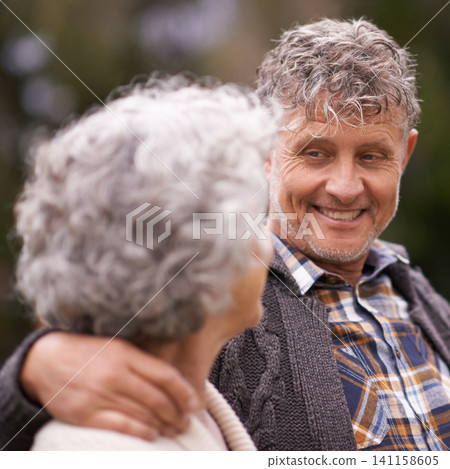 Senior couple, outdoor and smile with hug for retirement with bonding, love and support to relax together. Relationship, romance and happy or fun at park as family, soulmate and commitment 141158605