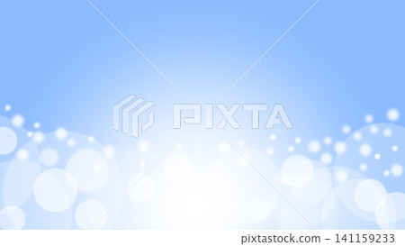 一張閃亮的藍色背景圖。它從中心向下散發出耀眼的光芒。底部散佈著許多白色的散景效果。 141159233