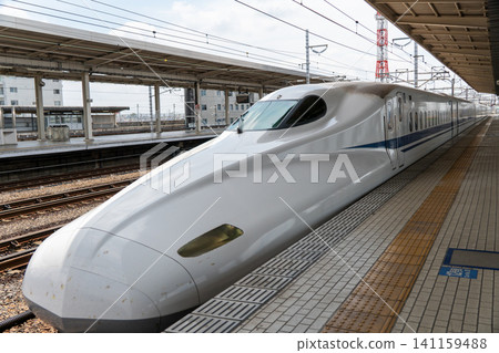 A Tokaido Shinkansen Kodama train stopping at Gifu-Hashima Station. A Tokaido Shinkansen Kodama train stopping at Gifu-Hashima Station. 141159488