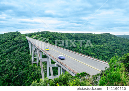 The Bacunayagua Bridge, located in Cuba, is the highest bridge on the island. The Bacunayagua Bridge, located in Cuba, is the highest bridge on the island. 141160510