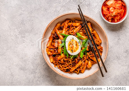 Rapokki - tteokbokki with noodles and chajang sauce Rapokki - tteokbokki with noodles and chajang sauce 141160681