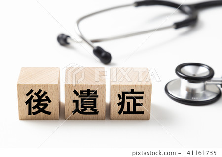 A block labeled "Aftereffects" and a stethoscope. A block labeled "Aftereffects" and a stethoscope. 141161735