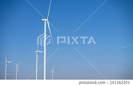 Wind energy and sustainable power generation with wind turbines, Eco-friendly solutions for renewable resources. Wind power farm and sustainable development of renewable energy, green technology. Wind energy and sustainable power generation with wind turbines, Eco-friendly solutions for renewable resources. Wind power farm and sustainable development of renewable energy, green technology. 141162201