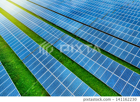 Solar farm and sun light. Solar power for green energy. Sustainable renewable energy. Photovoltaic power station or solar park. Solar panel installation and maintenance concept. Energy sustainability. Solar farm and sun light. Solar power for green energy. Sustainable renewable energy. Photovoltaic power station or solar park. Solar panel installation and maintenance concept. Energy sustainability. 141162230
