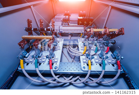 Wires and switches in electric box. Electrical panel with fuses and contactors Wires and switches in electric box. Electrical panel with fuses and contactors 141162315