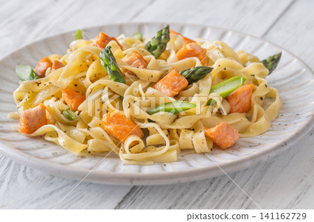 Healthy Fettuccine Pasta With Salmon And Fresh Asparagus Mediterranean Style Healthy Fettuccine Pasta With Salmon And Fresh Asparagus Mediterranean Style 141162729