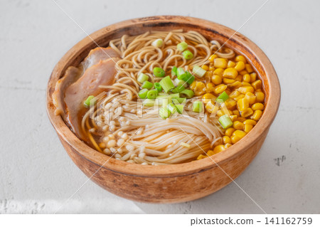 Japanese Ramen Soup With Pork Belly Corn And Enoki Mushrooms Japanese Ramen Soup With Pork Belly Corn And Enoki Mushrooms 141162759