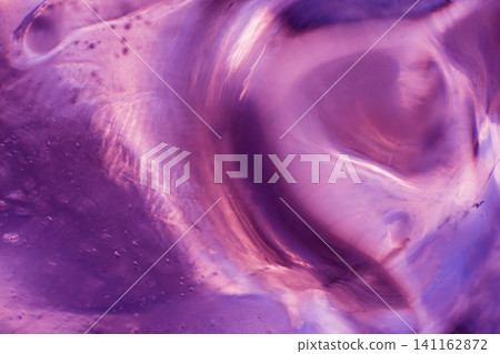 Beautiful abstract background. Ice close-up. The play of light. 141162872