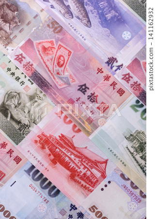 Taiwan, Taiwanese paper banknotes and coins, dollars of various denominations. Taiwanese dollars Taiwan, Taiwanese paper banknotes and coins, dollars of various denominations. Taiwanese dollars 141162932