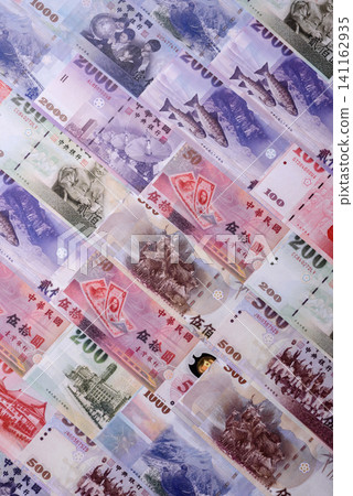 Taiwan, Taiwanese paper banknotes and coins, dollars of various denominations. Taiwanese dollars Taiwan, Taiwanese paper banknotes and coins, dollars of various denominations. Taiwanese dollars 141162935