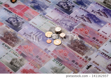 Taiwan, Taiwanese paper banknotes and coins, dollars of various denominations. Taiwanese dollars Taiwan, Taiwanese paper banknotes and coins, dollars of various denominations. Taiwanese dollars 141162937