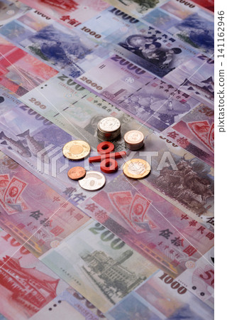 Taiwan, Taiwanese paper banknotes and coins, dollars of various denominations. Taiwanese dollars Taiwan, Taiwanese paper banknotes and coins, dollars of various denominations. Taiwanese dollars 141162946