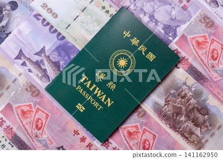 Taiwan, Taiwanese passport or id document with tickets for flight, travel. Taiwanese passport Taiwan, Taiwanese passport or id document with tickets for flight, travel. Taiwanese passport 141162950