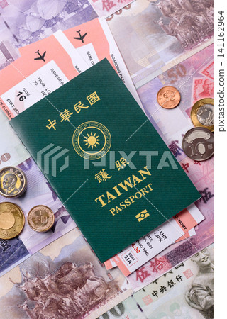 Taiwan, Taiwanese passport or id document with tickets for flight, travel. Taiwanese passport Taiwan, Taiwanese passport or id document with tickets for flight, travel. Taiwanese passport 141162964