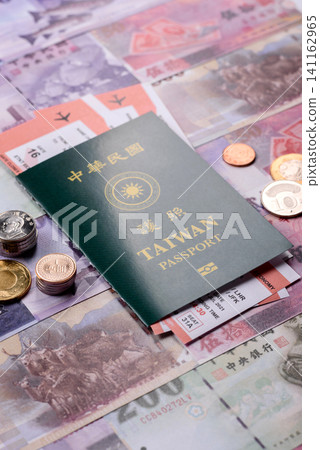 Taiwan, Taiwanese passport or id document with tickets for flight, travel. Taiwanese passport Taiwan, Taiwanese passport or id document with tickets for flight, travel. Taiwanese passport 141162965