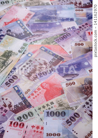 Taiwan, Taiwanese paper banknotes and coins, dollars of various denominations. Taiwanese dollars Taiwan, Taiwanese paper banknotes and coins, dollars of various denominations. Taiwanese dollars 141162970