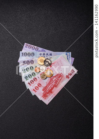 Taiwan, Taiwanese paper banknotes and coins, dollars of various denominations. Taiwanese dollars 141162990