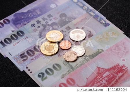 Taiwan, Taiwanese paper banknotes and coins, dollars of various denominations. Taiwanese dollars 141162994