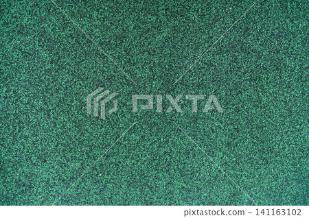 Hunter green color shingle roof texture background. Roofing material. Dense of rough dark green granules surface of shingle roof texture background. Shingle roof made of asphalt, plastic fiberglass. 141163102