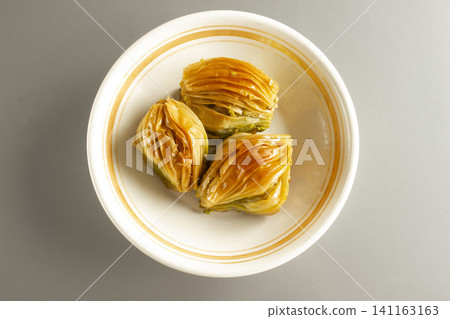 Turkish dessert baklava with pistachio Turkish dessert baklava with pistachio 141163163