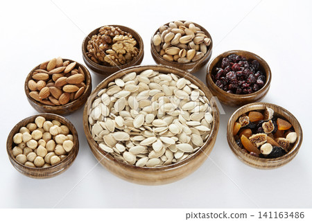 mixed nuts and dried fruits mixed nuts and dried fruits 141163486