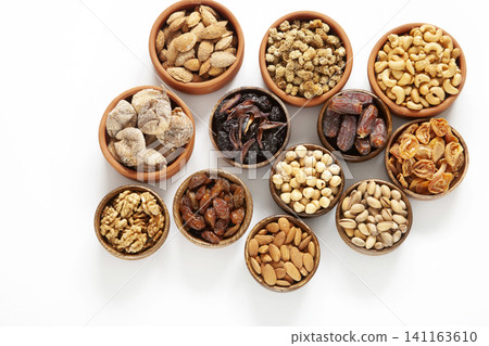 Dried fruits and mixed nuts. Healthy foods. Dried fruits and mixed nuts. Healthy foods. 141163610