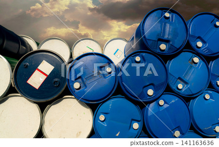 Old chemical barrels. Blue and red oil drum. Steel and plastic oil tank. Toxic waste warehouse. Hazard chemical barrel with warning label. Industrial waste in drum. Hazard waste storage in factory. Old chemical barrels. Blue and red oil drum. Steel and plastic oil tank. Toxic waste warehouse. Hazard chemical barrel with warning label. Industrial waste in drum. Hazard waste storage in factory. 141163636