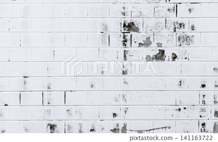 White brick wall texture background with space for text. Old white brick wall with peeling paint. Empty old brick wall. Home exterior and interior decoration concept. Architecture concept. White brick wall texture background with space for text. Old white brick wall with peeling paint. Empty old brick wall. Home exterior and interior decoration concept. Architecture concept. 141163722
