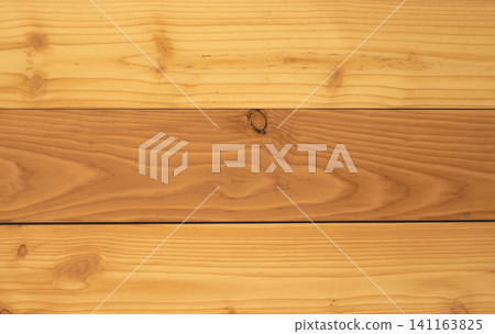 Closeup yellow wood texture background. Wood texture with unique pattern.Empty wooden wall. Surface of wood with beautiful unique pattern. Empty wood background for products advertisement. Closeup yellow wood texture background. Wood texture with unique pattern.Empty wooden wall. Surface of wood with beautiful unique pattern. Empty wood background for products advertisement. 141163825
